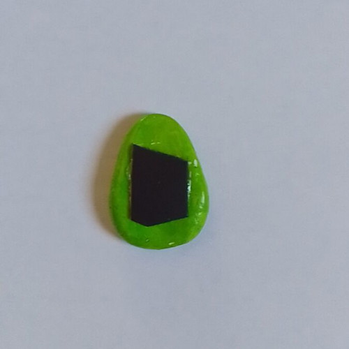 Handmade papaya magnet from clay