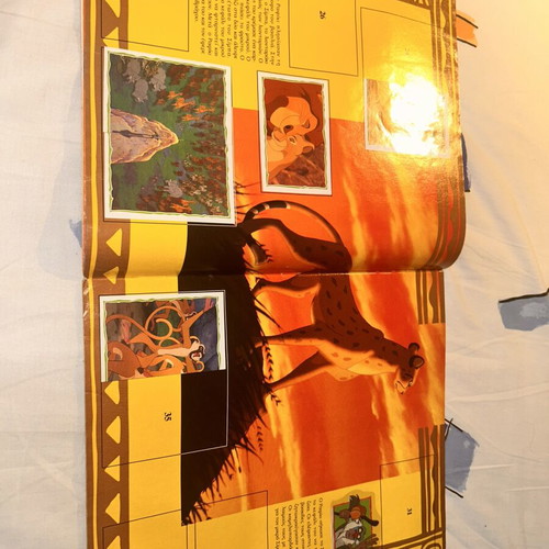 The Lion King Panini album used with 62 stickers