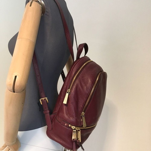 Michael Kors genuine leather backpack used, red
