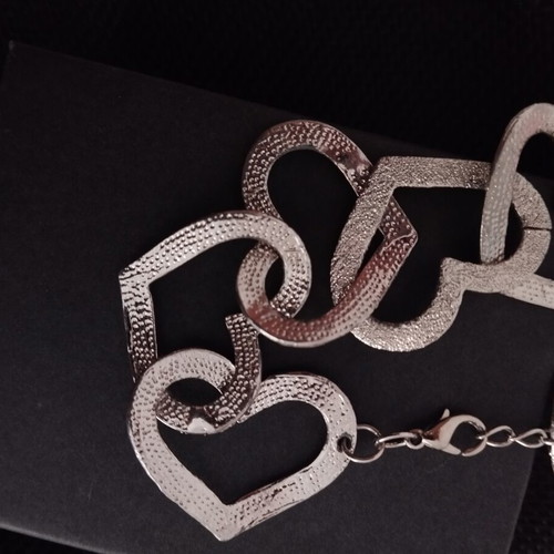 Silver heart bracelet used