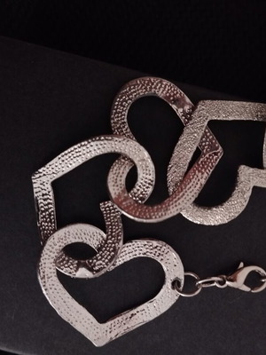 Silver heart bracelet used