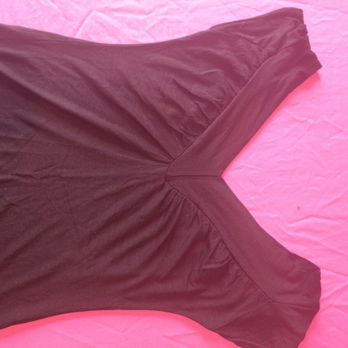 Basic black blouse used with v-neck and chest gathers