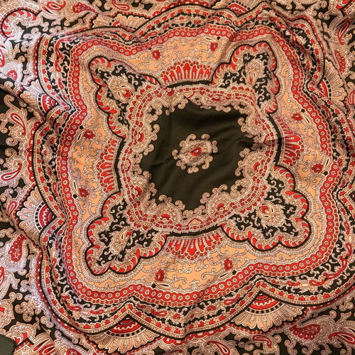 Large square scarf used in green and red