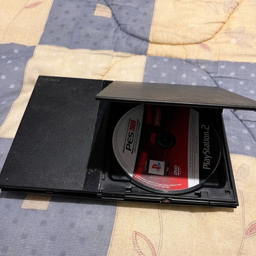 PlayStation 2 Slim used, functional without power cable