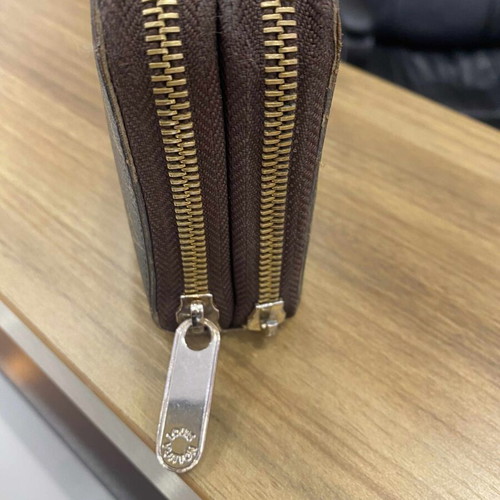 Louis Vuitton double zipper monogram wallet used, brown