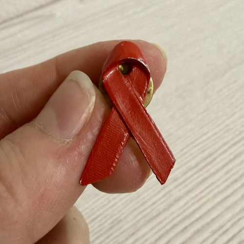 Red Ribbon metal pin, HIV awareness symbol