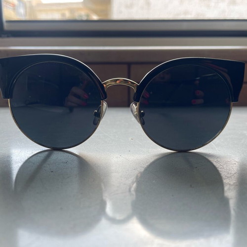 Sunglasses cat eye style like new, black and gold
