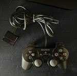 Playstation 2 controller genuine, unknown if working