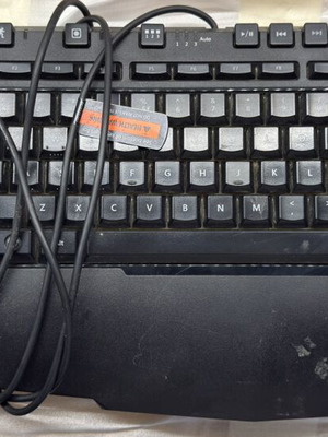 Microsoft SideWinder X6 keyboard used with detachable numeric keypad and red lighting