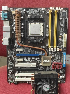 Asus M2N-SLI Deluxe motherboard with AMD Athlon 64 X2 CPU and cooler