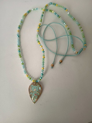 Children's teddy bear necklace with crystals, turquoise and gold colors