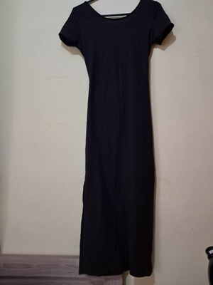 Pink Woman black dress used with open back and side slits