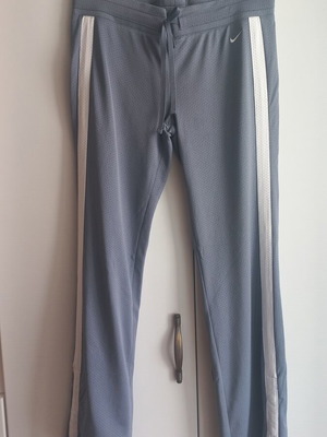 Nike women's grey sports pants with buttons and drawstring