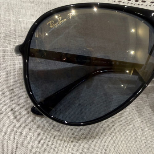 Ray Ban sunglasses black unisex used with minor lens scratches