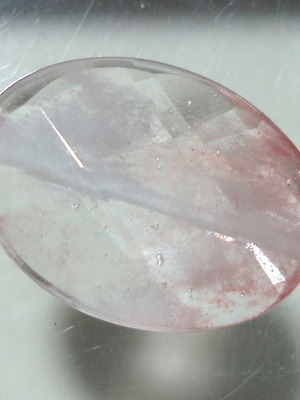 Quartz mineral with oxide inclusions like new