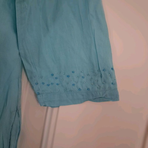 Turquoise tunic used with beads on neck and sleeves, one size