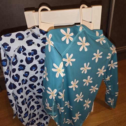 Girls' one-piece swimsuit with long sleeves like new, colorful, size 110 cm