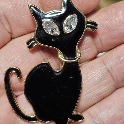 Cat brooch, black and gold