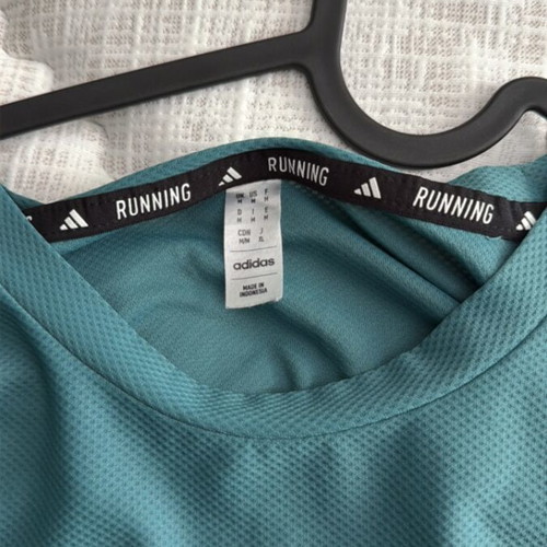 Adidas shirt used, turquoise, size M missing two stripes