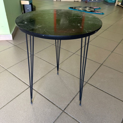 Round side table used with black marble look and metal hairpin legs