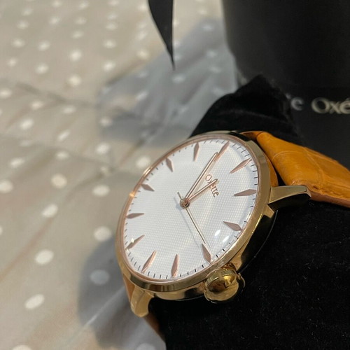 Oxette wristwatch used, brown and gold