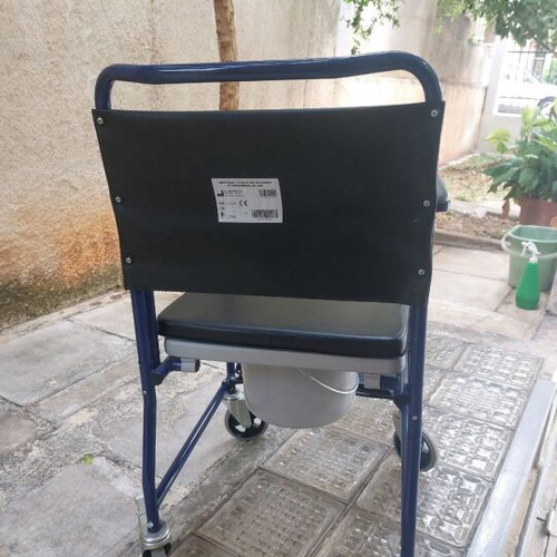 Commode wheelchair with metal frame, like new