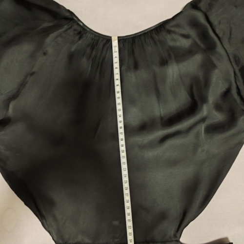 Black mini dress used with open back and bell sleeves, size S