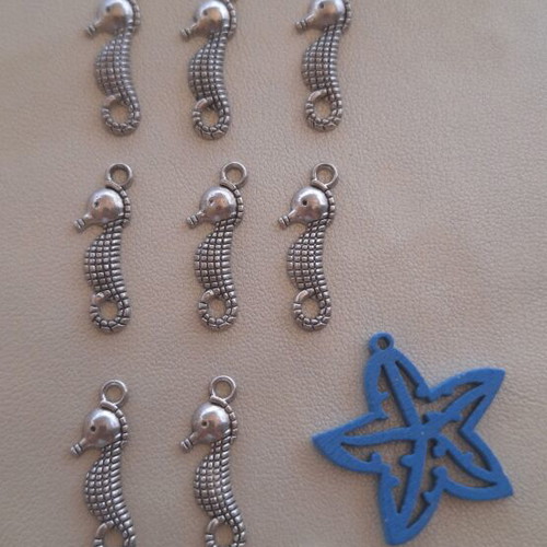 8 metal seahorse charms and 2 wooden starfish
