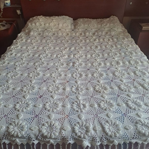 Handmade super double blanket with embossed designs and crocheted fringes