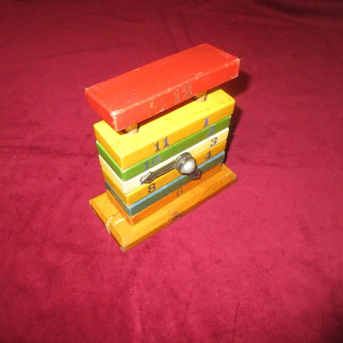 Wooden toy clock coil used 70s