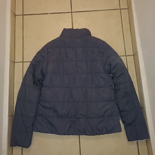 Reversible jacket used, blue-purple and white, size S