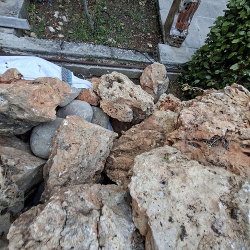 Decorative stones with holes used for waterfalls and rock gardens