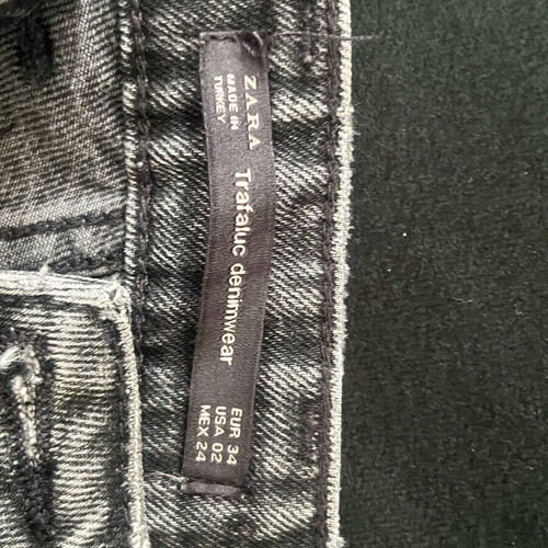 Zara jeans used, charcoal/black, size 34 with feathers