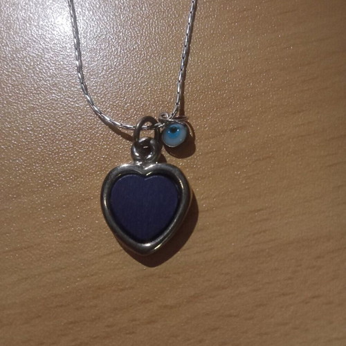 Heart eye necklace like new, charm good luck
