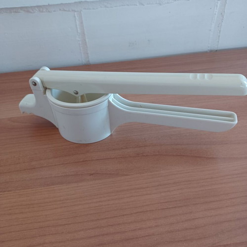 Manual plastic potato masher like new