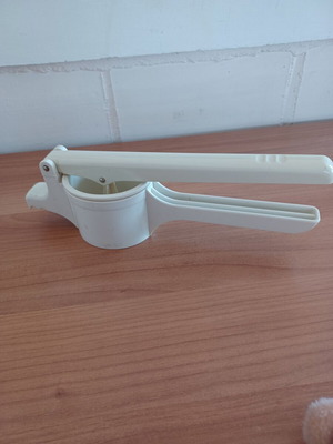 Manual plastic potato masher like new