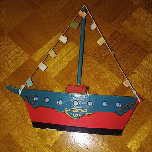 Handmade boat decoration used, paper and wood