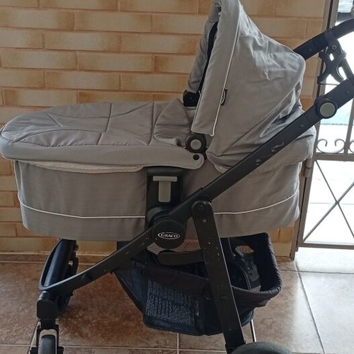 Graco 3-in-1 stroller used with carrycot, footmuff, and rain cover