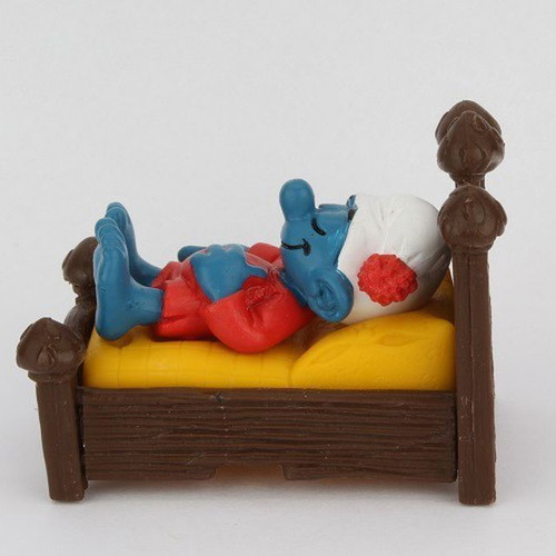 Smurf in bed like new, Schleich 5.5cm figure