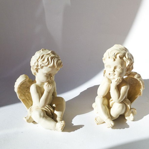 Vintage set of 2 resin cherubs in classic Renaissance style like new