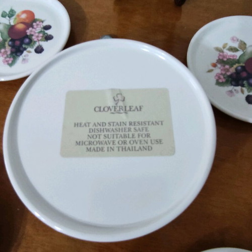 Vintage bakelite coasters like new with fruit design