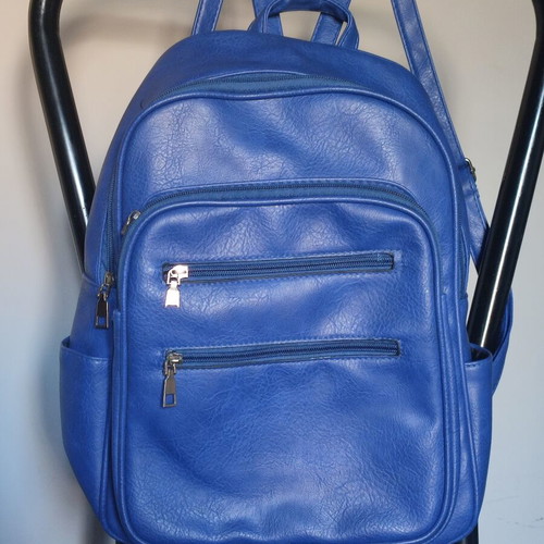 Blue women's backpack like new, PU leather with embossed texture