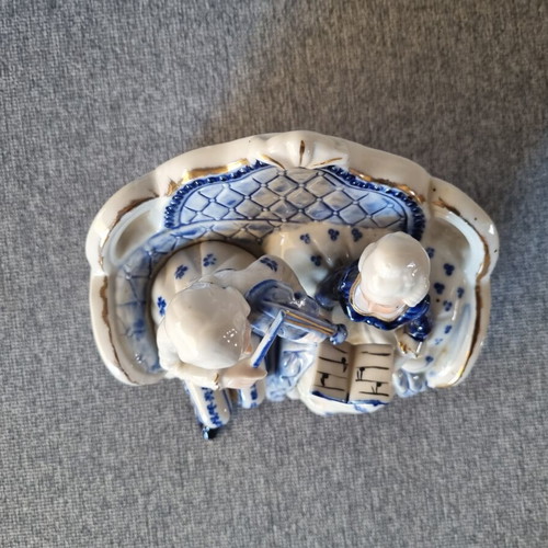 Vintage porcelain Rococo couple figurine blue and gold details