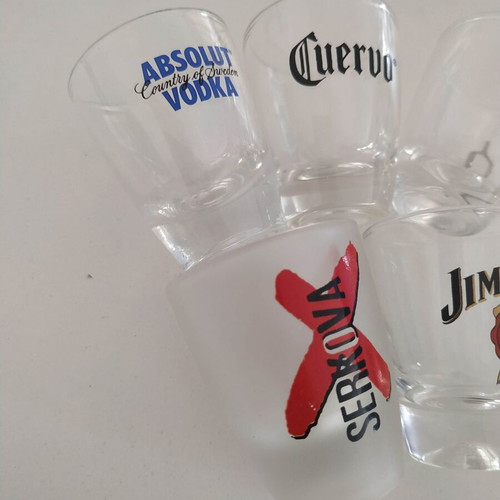 Set of 5 used glass shot glasses with liquor logos