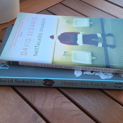 David Sedaris books like new, Happy-Go-Lucky and Santaland Diaries, 2 pcs