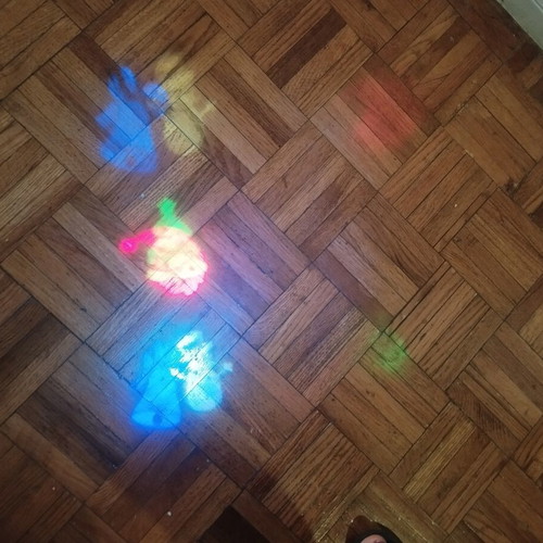Projector lights with holiday designs used, snowman, Santa, fir tree