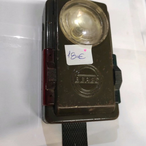 Military type flashlight used with batteries