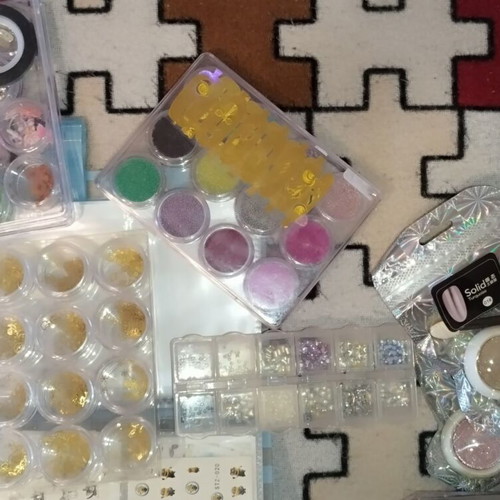 Large nail art set like new with glitter, foil, rhinestones, and decorations