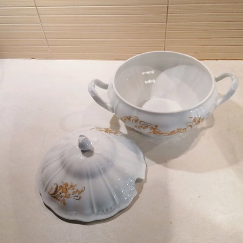 Porcelain soup tureen used with gold floral details
