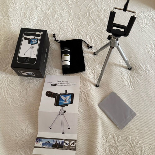 Smartphone tripod with extra telephoto lens like new